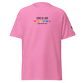 Big Daddy Allen Productions pink cotton t-shirt with "LOVE IS LOVE" text and rainbow hearts, Pride Month 2026 graphic.